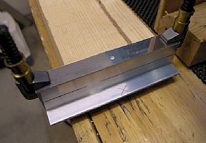 Used the W-932DG Drill Guide(s) to drill the holes on the flanges of T-912 Attach Angles