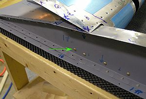 Riveted the counterbalance assembly to the left elevator