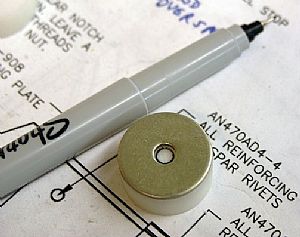 Try to drill holes in the Delrin spacer stops