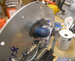 Riveted on the anti-rotation and torqued on the elbow fitting