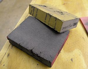 Sanding them holes