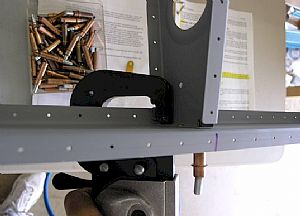 Started riveting the rear spar to the ribs