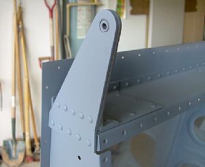 Riveted on the Aileron Brackets