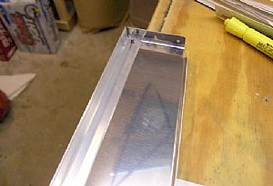 Positioned the F-729B angle inside the F-729A bellcrank rib
