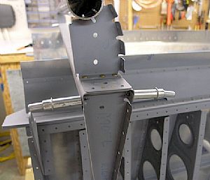 Riveted on the end ribs