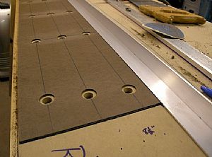 Laid the aluminum angle next to the masonite sheet