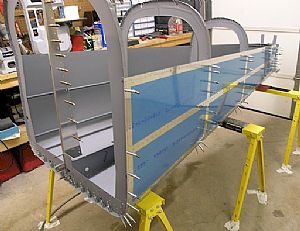 Finished riveting the bottom; now for the flip side