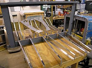 Clecoed in the F-725, 726, and 727 baggage ribs