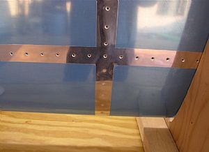Finished riveting in the front HS-905 nose ribs into the right HS skin