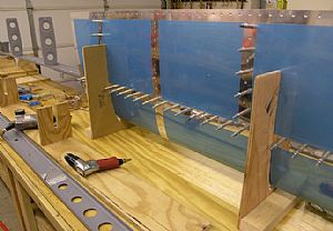 Clecoed the Front spar into position in the Right HS skin