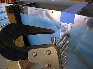 Hand squeezed the first aft rivet on all the ribs, all the way around