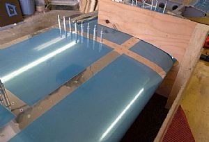 Finished riveting the front main spar to left HS skin