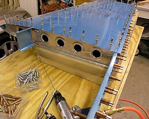 Started clecoing the VS skin on to the spars and ribs