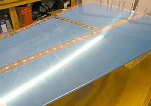 Finished riveting the VS skin to the front spar and middle rib