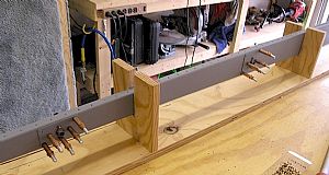 Clecoed and riveted reinforcement plates and nuts