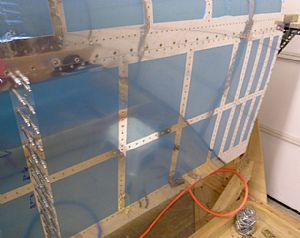 Finished riveting the inboard top skin