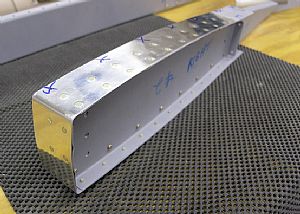 Riveted on the E-913 counterbalance skin on