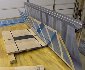 Started work on riveting the stiffeners to the right elevator skin