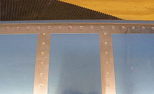 Pop-riveted the elevator bottom skin to the main spar