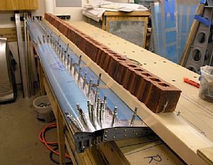 Clecoed on the leading edges on the right flap top 