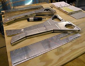Started deburring and sanding the center section ribs.