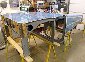 Positioned the center and tail sections on the sawhorses