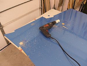 Drilled the foot step holes in the F-970 forward side skins