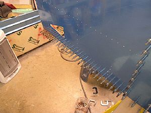 Drilled the skin to the forward longerons