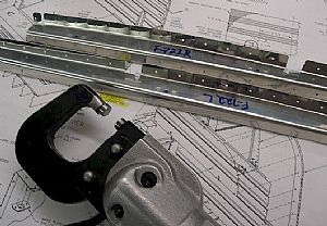 Riveted on the nutplates to the F-722 ribs