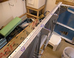 Countersunk the forward longeron and dimpled the firewall flange