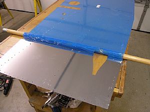 Remove the blue film from the backs of the side skins