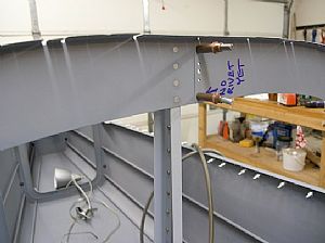Riveted the top of the F-728A vertical channel to the F-706 bulkhead