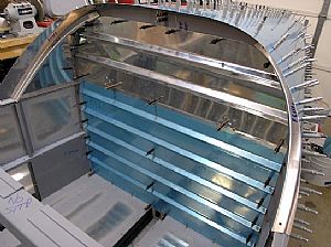 Drilled all the nutplate holes into the bulkhead using the panel holes