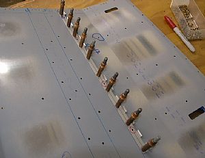 Time to rivet the F-637E hinges to the F-742-L&R aft seat floors