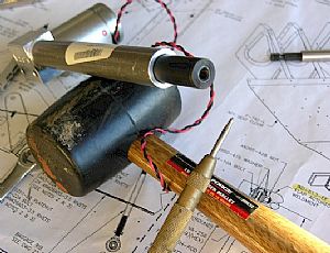 Drilling the safety wire hole into the ES-85615-157 flap motor shaft