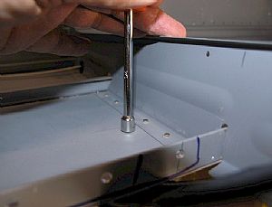 Supporting the pop-rivet and the fuselage skin