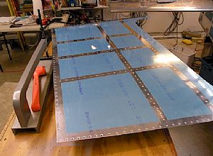 Dimpled the forward deck skin