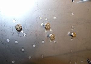 Reinforcement plate and nutplates installed