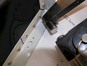 Time to rivet the side brackets to the battery box