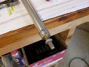 End pieces pop-riveted into place