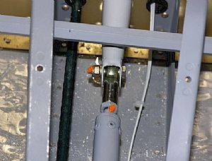 Tightened the nuts on the forward end of the elevator push rod