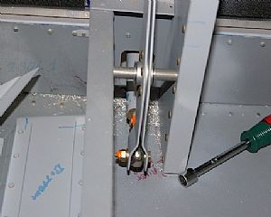 Tightened the nuts on the aft end of the elevator push rod