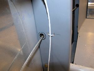 Keeping the headset away from the rudder cable