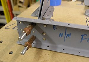 Starting riveting the nose rib/hinge assemblies to the left FL-903 Spar